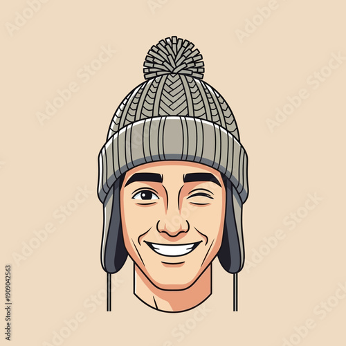 Man winking wearing a winter beanie with ear flaps and pompom