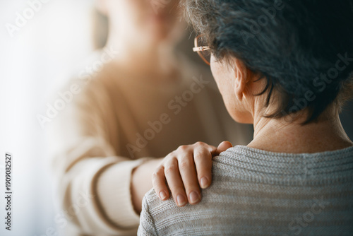 Photos Compassionate Gesture of Support and Comfort