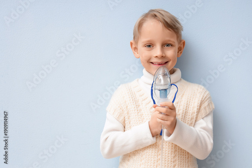 Cute little boy with nebuli...