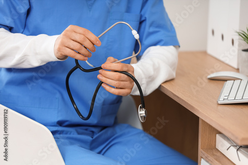 Male doctor with stethoscop...