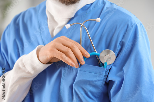 Male doctor with stethoscop...