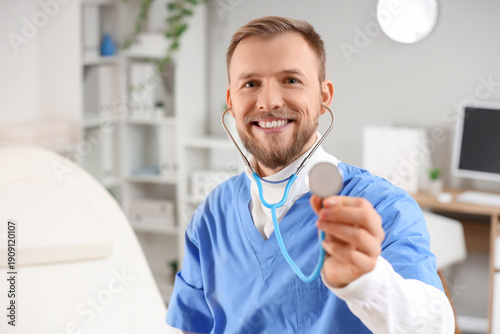Male doctor with stethoscop...