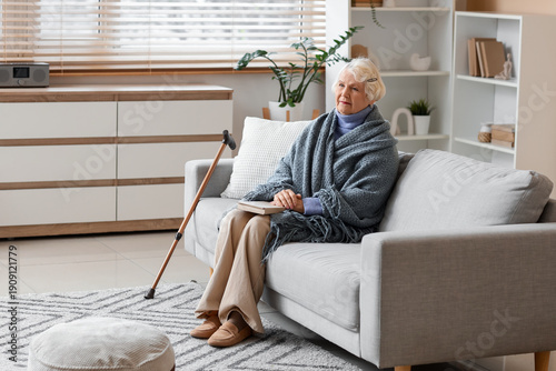 Thoughtful senior woman wit...