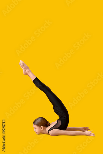 Cute girl doing gymnastics ...