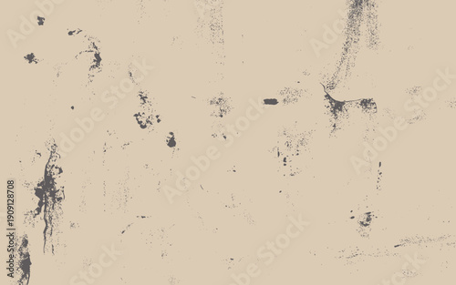 Abstract textured background with dark grunge splatters and distressed effect overlaying a light beige canvas for vintage design elements distressed paper vintage paper weathered material grunge textu