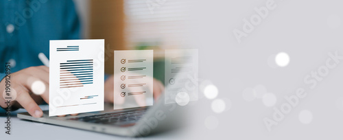 Digital document management concept with virtual checklist and online report interface over laptop. Business data analysis, paperless workflow, audit process and corporate compliance technology.
