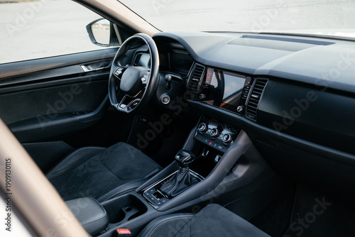 Wallpaper Mural Modern interior of a family SUV, leather steering wheel, sports leather seats, large navigation screen. Interior details. Torontodigital.ca
