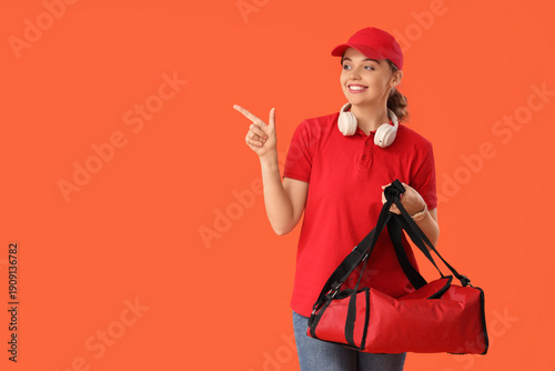 Female courier with food ba...