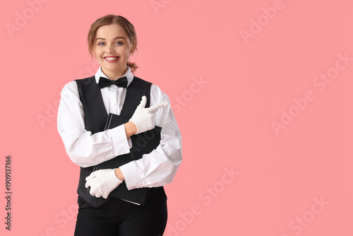 Young waitress with menu po...