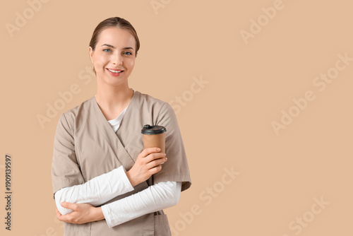 Female massage therapist wi...