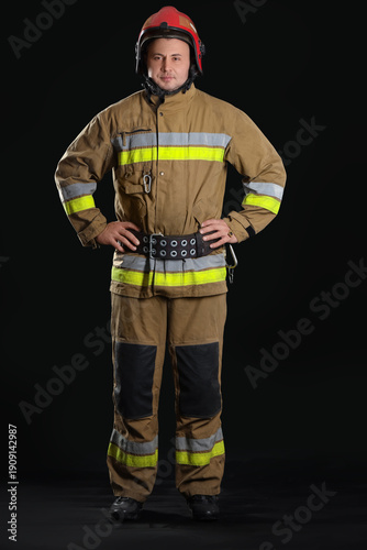 Male firefighter on black b...