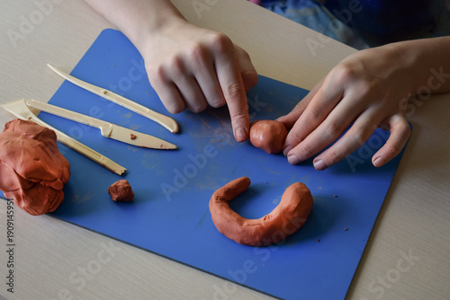 Εκτύπωση καμβά Children sculpting natural clay flat lay step 1 preparing material and tools for