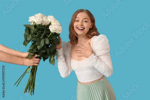 Beautiful young woman recei...