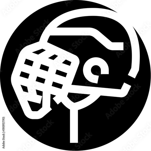 Person's head in profile showing a protective or restraining mask, illustrating concepts of control, confinement, silence, protection, and restricted movement within a dark circular frame