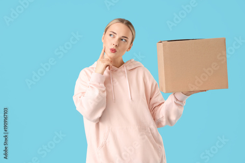 Thoughtful young woman with...