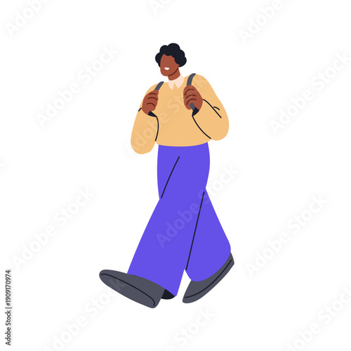 Happy black man walking with backpack. Smiling young African-American student...