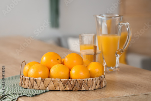 Wicker tray with oranges an...