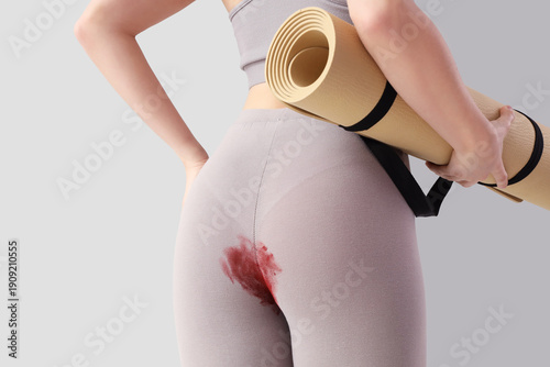 Sporty young woman in stain...