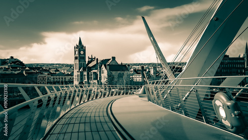 Tableau sur toile Split toned black and white view of the Guildhall in Derry, Ireland from the ped