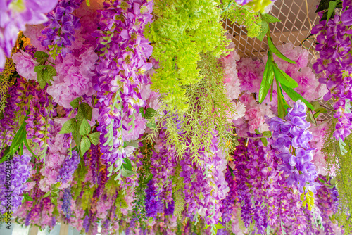 Vibrant Artificial Flower Ceiling Display.