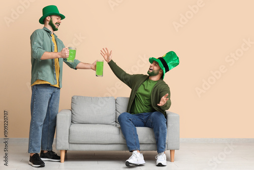 Young men in leprechaun hat...