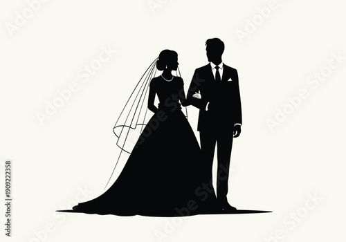 Silhouette of bride and groom standing together arm in arm