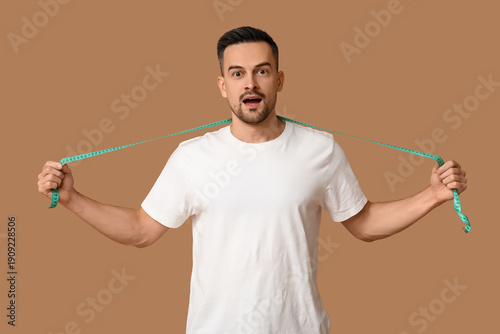 Handsome sporty shocked man...