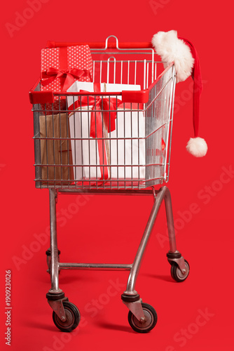 Shopping cart with Santa ha...