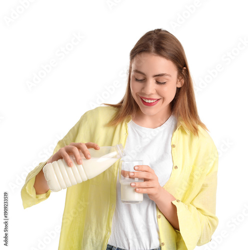 Happy young woman with milk...