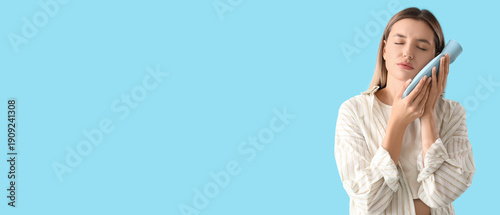 Young woman with hot-water ...