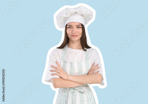 Confident female chef in uniform on blue background