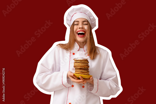 Happy young female chef wit...