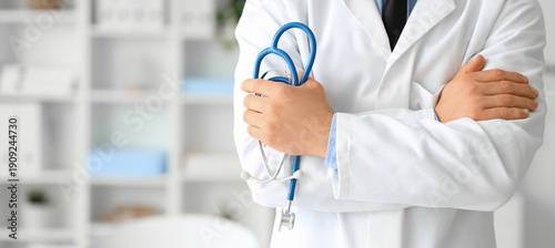 Male doctor with stethoscop...