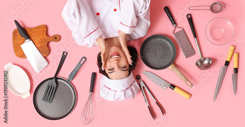 Surprised young female cook...
