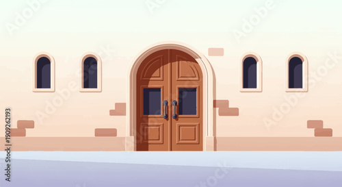 A light-colored building facade with a prominent arched wooden double door