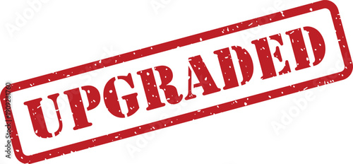 A bold red distressed rubber stamp displaying the word UPGRADED prominently on a plain white background