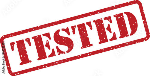 A red grunge rubber stamp impression clearly shows the word TESTED on a white background