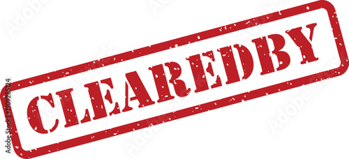 A vibrant red rubber stamp with a grunge texture displaying the text CLEAREDBY diagonally on a white surface