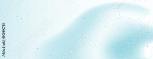 A light blue background with a soft, smooth texture. The background features a subtle gradient with blue speckles throughout. Gradient patterned background vector. Blue background.