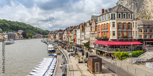 Panorama of historic houses at the waterfront promenade in Dinant, Belgium