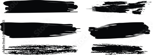 A collection of six black brush strokes on a white background for design and artistic use