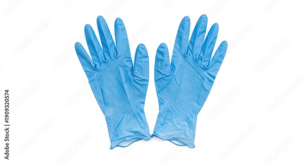 Obraz premium Blue nitrile gloves on white background in bright studio lighting for medical use