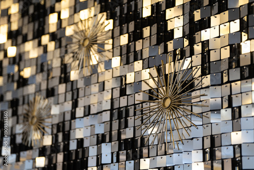 Glamour mirrored background made of small broken mirror pieces arranged in a textured mosaic pattern. 
