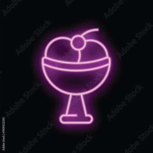 Bright pink neon sign is glowing in the dark showing a delicious ice cream sundae with a cherry on top