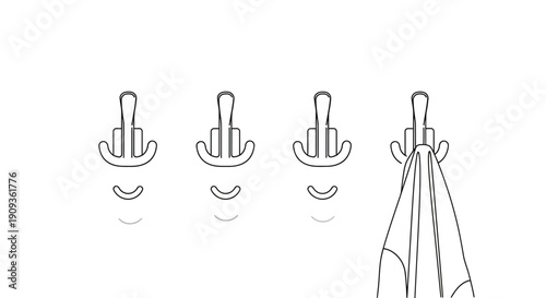 Four wall hooks with one holding a towel, minimalist design, white background
