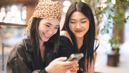 Photography Enjoy two young asian woman gen z sisters using smartphone share travel moment o