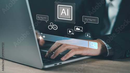 Fényképezés Typing on laptop with floating AI icons and search bar generative AI technology used for multimedia content creation, automation, and smart virtual assistant tools by a user
