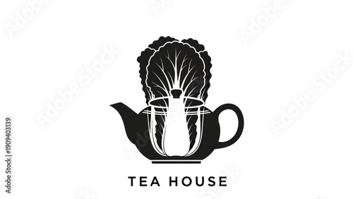 A tea pot with a large, leafy element emerging from a clear glass cup