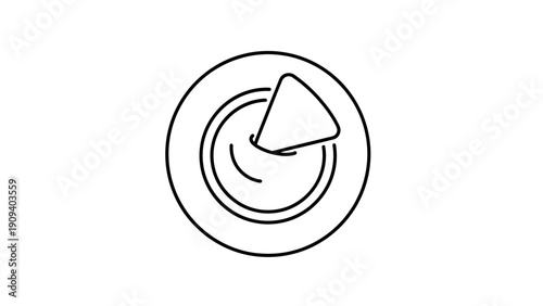 A circular plate with concentric rings and a stylized triangular object