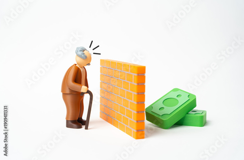 Photography A pensioner is cut off from his savings by a wall